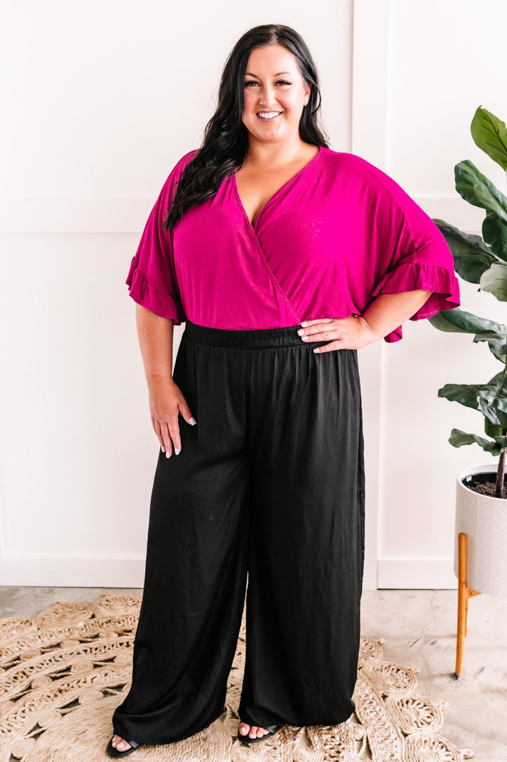 Going With The Flow Bodysuit In Deep Magenta